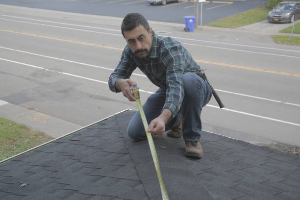 istock Roofer measuring roof with face 1350689386