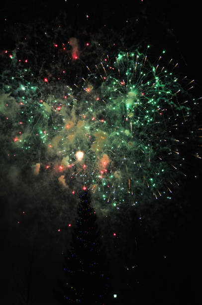 istock green and red fireworks at night 1350696795