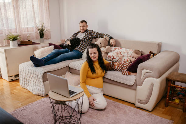 istock Happy young family at home 1350706878