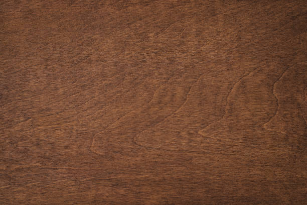 istock brown wood texture, dark table from old boards background 1350710547