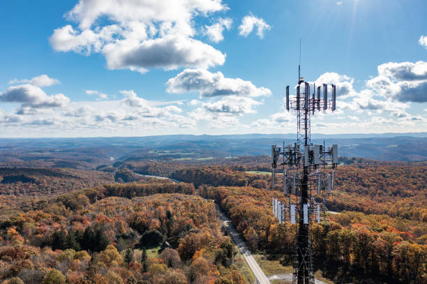 Cell phone or mobile service tower in forested area of West Virginia providing broadband service stock photo