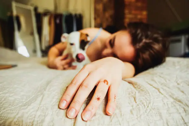 Photo of Close up of woman hand with henna tattoo.