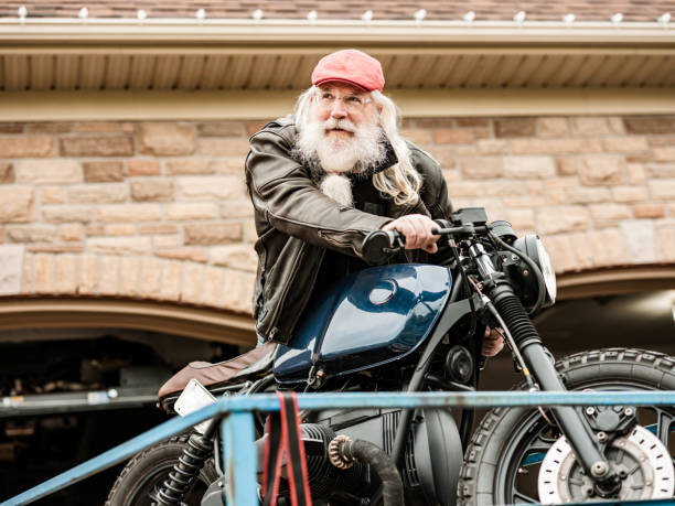 istock Senior man working on his motorcycle 1350713228