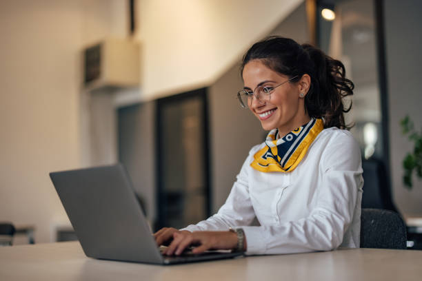 istock Adult woman, having fun at work 1350714124