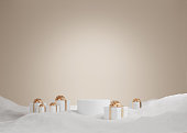 3D podium display, Christmas background for product presentation or text.  Christmas beige backdrop with snow. White pedestal showcase with gift and gold ribbon. Studio abstract, winter 3D render.