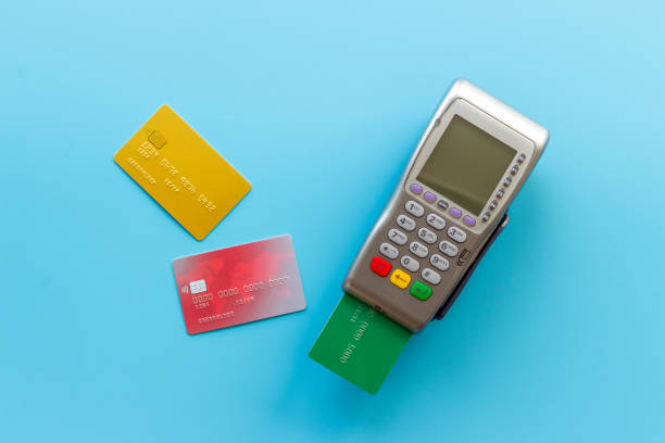 istock Payment transactions with credit card by pos terminal. Top view 1350718286