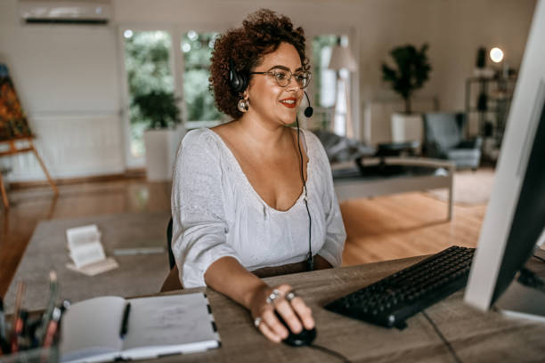 istock Businesswoman working on computer at home 1350719449