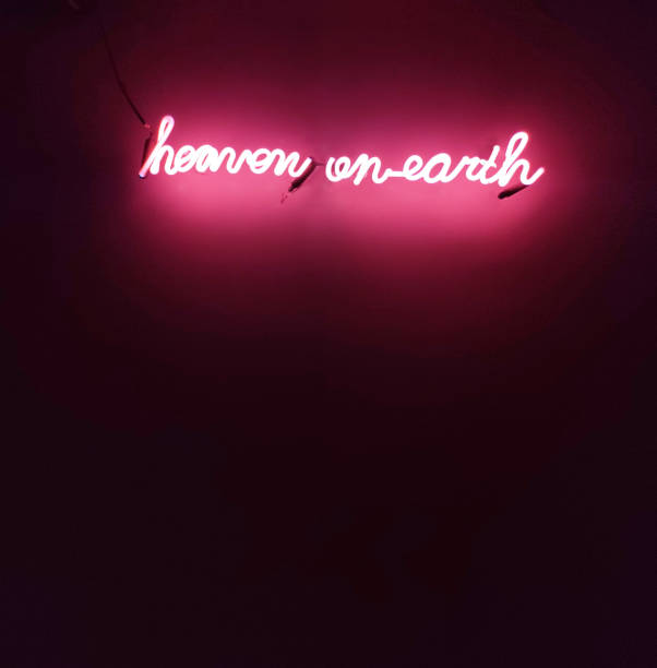 istock Heaven on Earth optimistic neon sign 1350719519