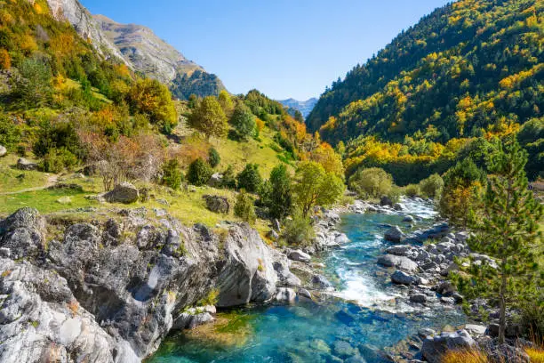 Rio Ara river in Bujaruelo of Ordesa Valle de Ordiso Autumn at Huesca Pyrenees in Spain