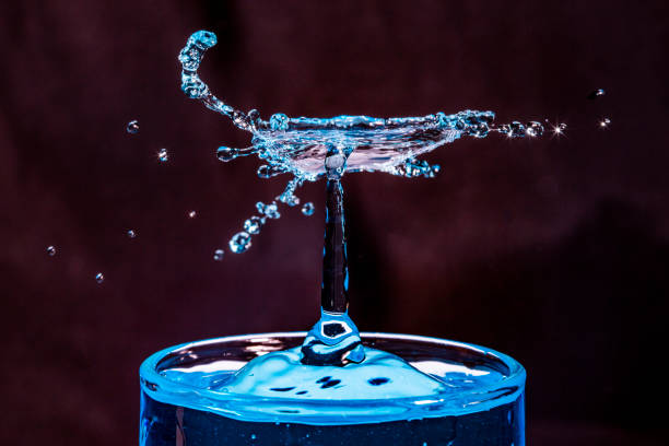 istock Macro Shot of a Water Drop Collision 1350722857