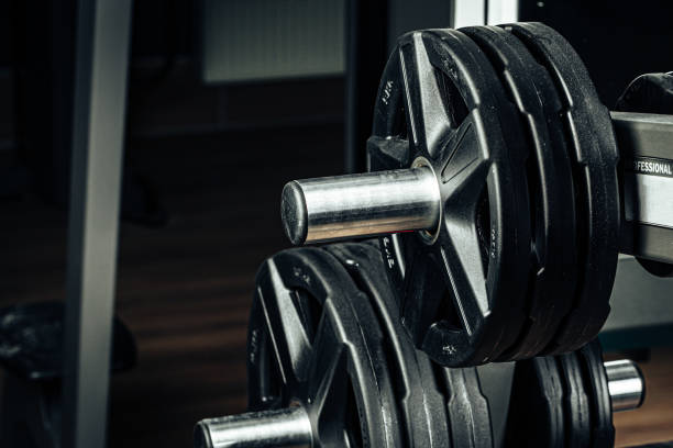 Gym weight plates on holder close up