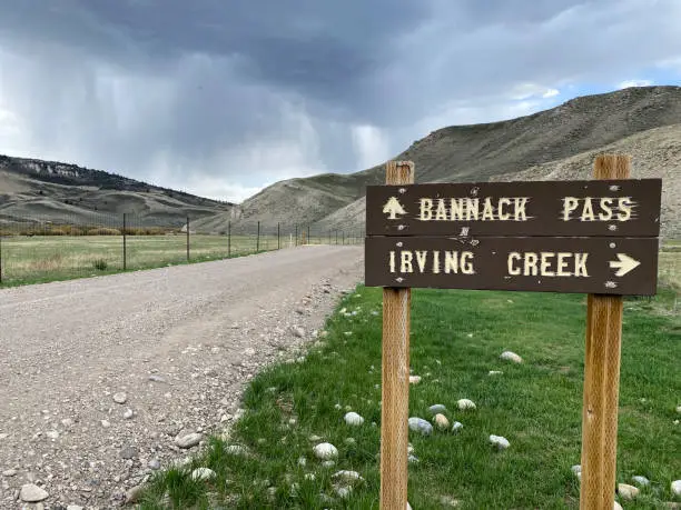 Directional road sign for Bannack Pass and Irving Creek