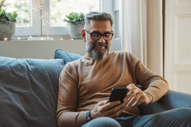 istock Mature man at home for Christmas 1350728010