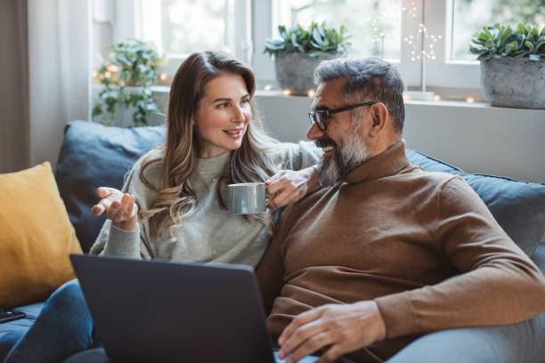 istock Mature couple at home for Christmas 1350728110