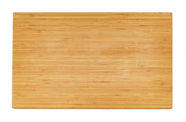 istock Wooden cutting board on a white background 1350728865