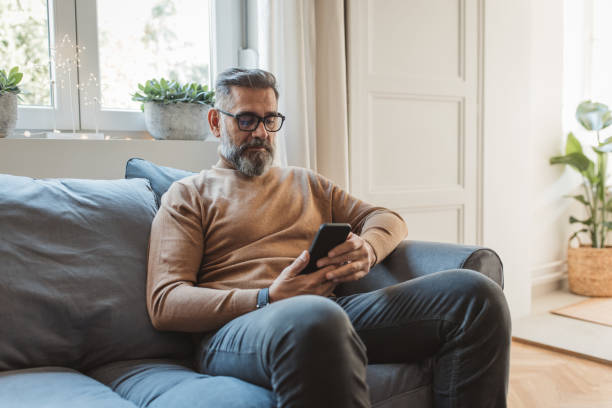 istock Mature man at home for Christmas 1350730235
