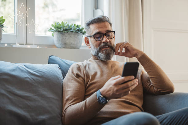istock Mature man at home for Christmas 1350730238
