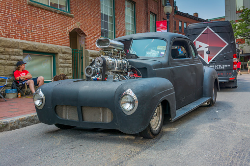 Moncton, New Brunswick, Canada - July 10, 2015  : 1940 Dodge coupe with blown Hemi in downtown Moncton during 2015 Atlantic Nationals, Moncton, NB, Canada.