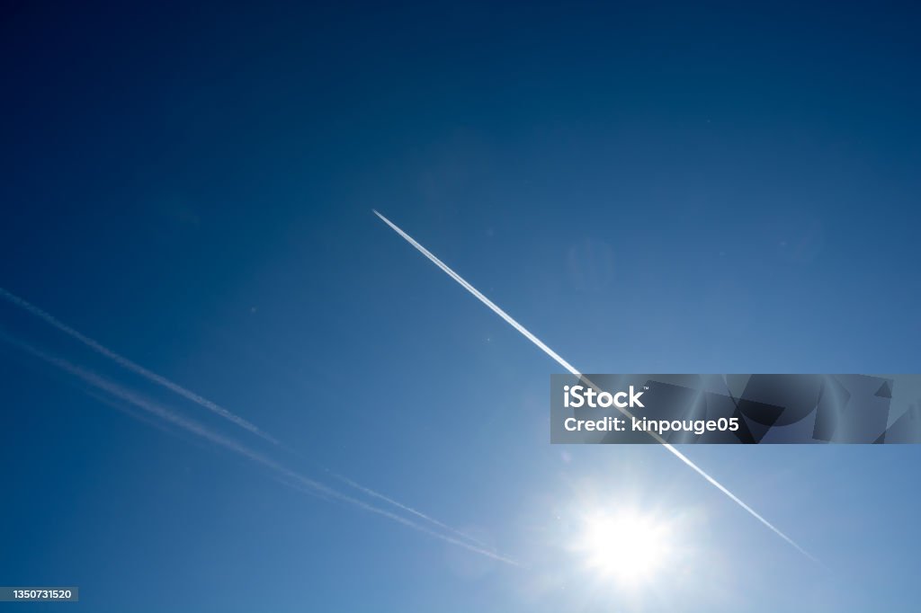 Rime on a sunny winter morning and contrail Air Vehicle Stock Photo
