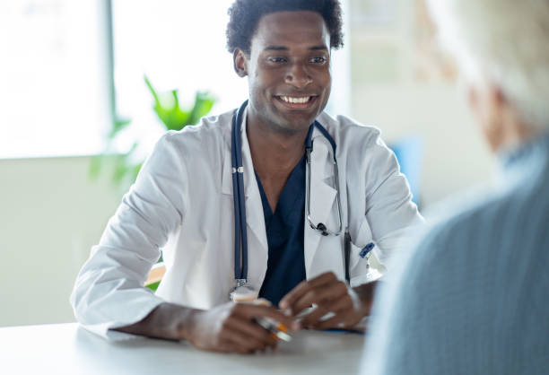 istock Senior Woman at a Doctors Appointment 1350731597