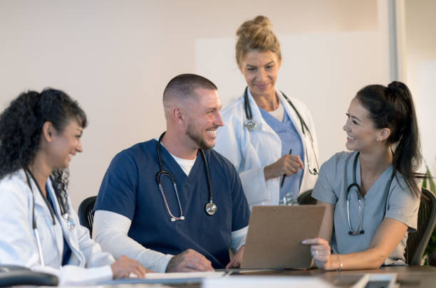 istock Medical Students Discussing Patient Cases 1350731777