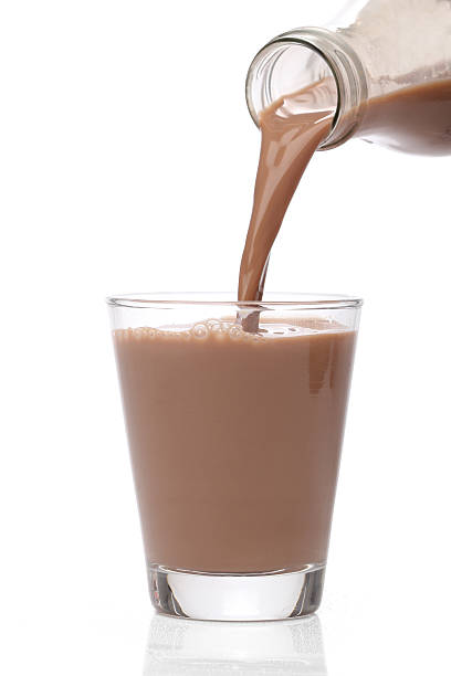 istock Bottle pouring milk chocolate into a glass 135073450