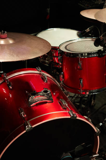 istock Closeup of Clean Red Drum Set at Concert 1350735734