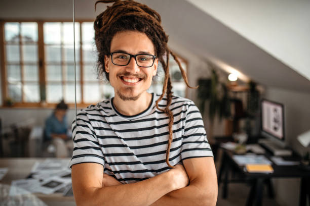 istock Portrait of young,cheerful graphic designer in studio 1350738263