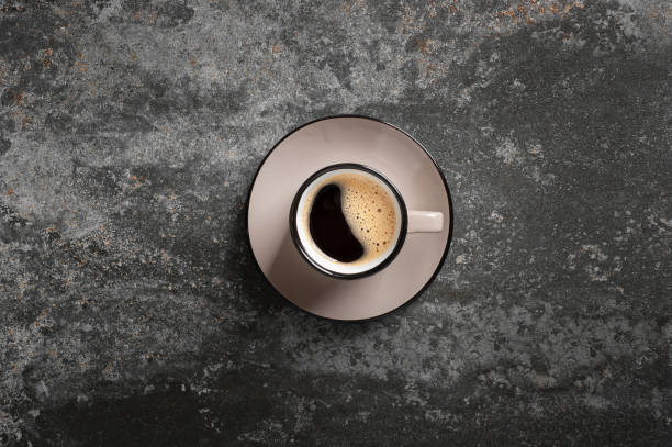 istock cup of coffee with beautiful foam on a concrete background top view copy space 1350744496
