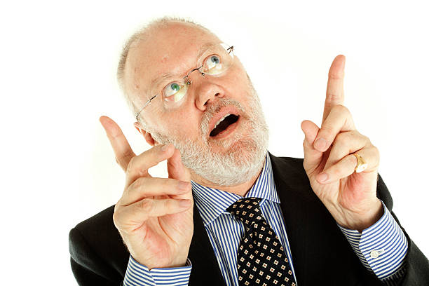 istock Elderly man pointing fingers up 135074741