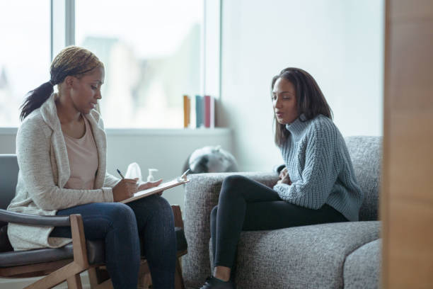 istock Sitting in a Counselling Appointment 1350748002