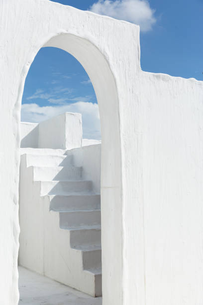 istock Mediterranean white house with sky and cloud background 1350755433