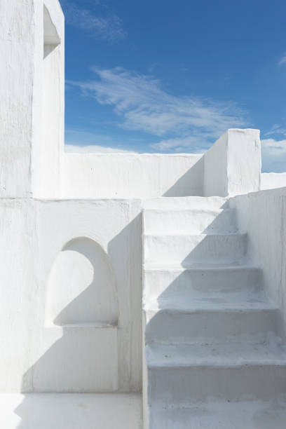istock Mediterranean white house with sky and cloud background 1350755452