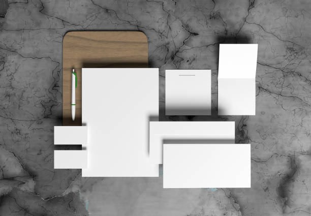 istock Stationery branding mockup template with red A4 Letterhead, business card, envelope, note book pencil, trifold brochure with gray marble  background 1350761927