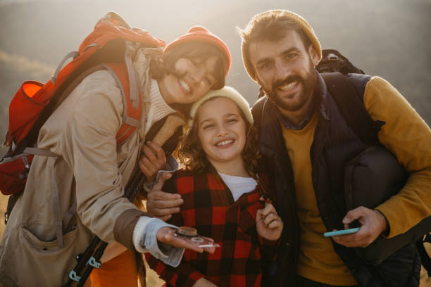 istock Backpacking family spending time together 1350761938