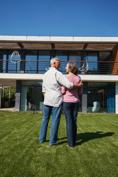 istock View from back of caring couple smiling at each other 1350766039
