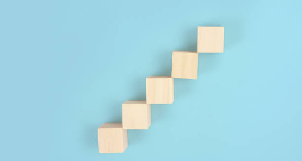 istock Wooden blocks chart steps with copy space. The business growth process 1350766787