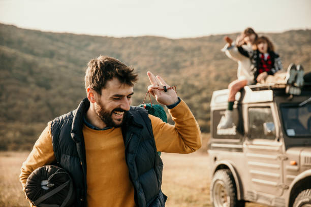 istock Come on family, let's set up a camp here 1350767601