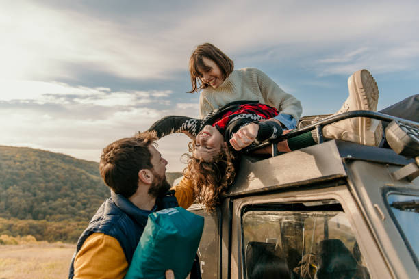 istock Come on family, let's set up a camp here 1350767606