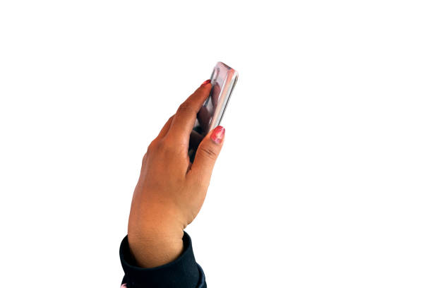 Cut out female hand holding mobile in selfie mode