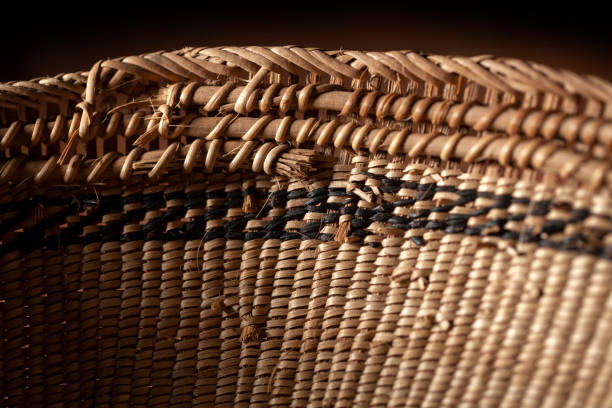 Close up of braided basket. Traditional handicraft product. Natural plant fibre braided basket is handmade. The designs are ethnic in origin. Handicraft product of Indigenous tribes in Brazil. basket weaving stock pictures, royalty-free photos & images