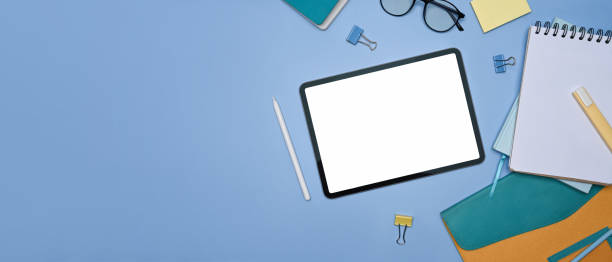 istock Mock up digital alert, notebook and stationery on blue background. 1350770459
