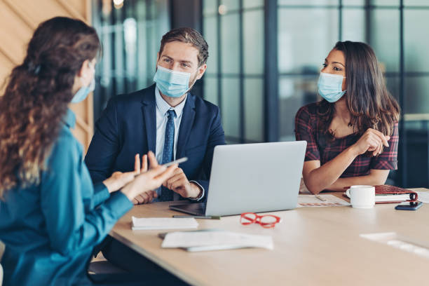 istock Coronavirus protection during the business meeting 1350785611