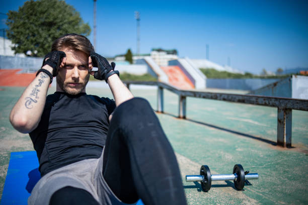 istock A young man in shape exercising outdoors 1350786979