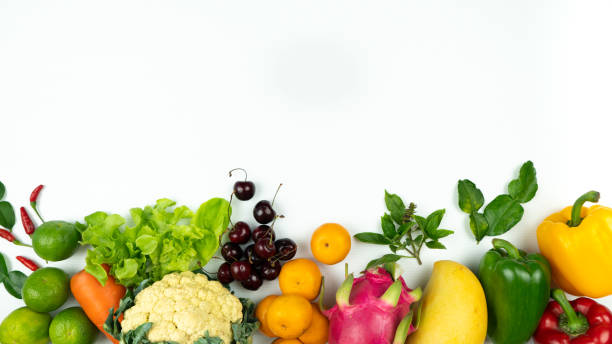 istock Fresh fruit and vegetable. Flat lay of fresh raw organic vegetables on white background 1350787020