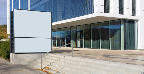 istock Information  billboard  is installed near the new  office  building 1350787063