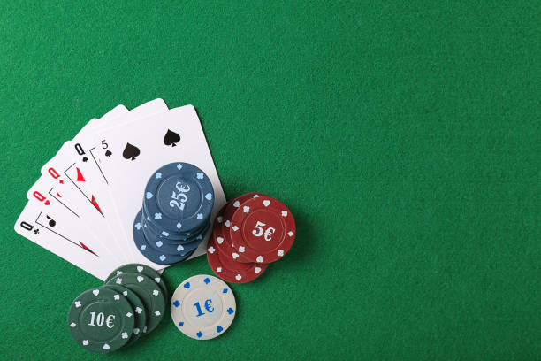 istock Chips and cards on table in casino 1350787784