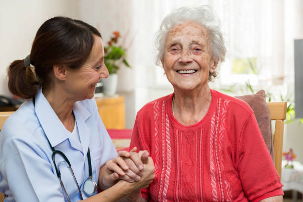istock Care – Nurse with Senior Patient 1350788109