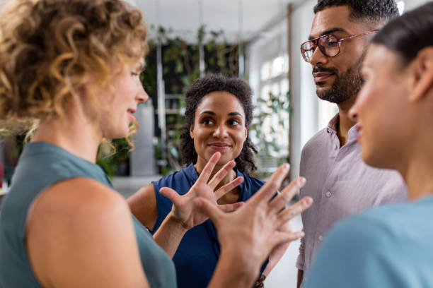 istock Multi-Ethnic Business Colleagues Discussing Ideas 1350788506