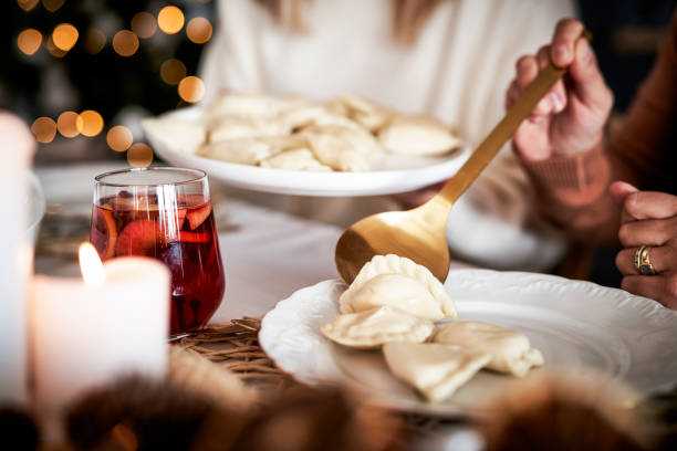 Eating dumplings at the Christmas Eve stock photo